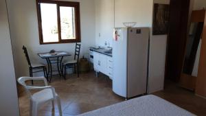 Dapur atau dapur kecil di Pousada Itapuã RS