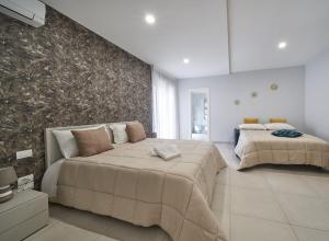 Posteľ alebo postele v izbe v ubytovaní B&B Iside