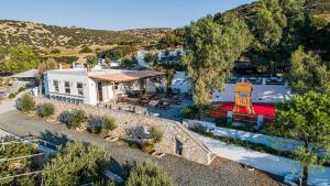 an overhead view of a building with a red roof at Anassa Cycladic Village in Galissas