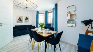 Posedenie v ubytovaní Apartamenty EverySky Nad Łomnicą 15-15A