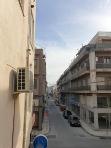 a view of a street from a building at central studio very close to the port of Volos in Volos