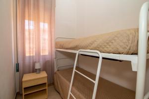 Postel nebo postele na pokoji v ubytování Casa Spiaggia Molo 4