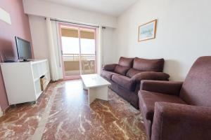 TV a/nebo společenská místnost v ubytování Apartamentos Nuevo México C 132