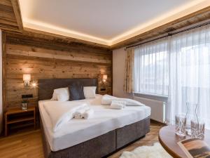 Posteľ alebo postele v izbe v ubytovaní Tennenwirt Guesthouse - Adults only