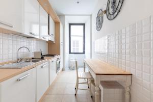 Kuchyňa alebo kuchynka v ubytovaní maison Colosseo