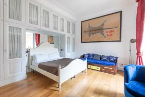Posteľ alebo postele v izbe v ubytovaní maison Colosseo