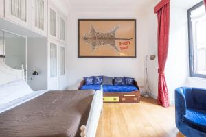 Posteľ alebo postele v izbe v ubytovaní maison Colosseo
