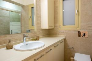 Kúpeľňa v ubytovaní Kallia Apartment + 11 fotografií