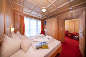 Postel nebo postele na pokoji v ubytování Hotel Latini