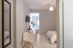 TV a/nebo společenská místnost v ubytování Hotel Club Eloro