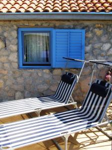 Photo de la galerie de l'établissement Charming dalmatian apartment with panoramic view, à Tkon