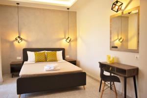 A bed or beds in a room at Studios Periklis