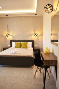 A bed or beds in a room at Studios Periklis