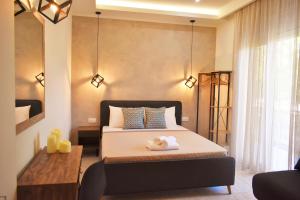 A bed or beds in a room at Studios Periklis