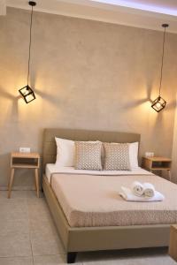 A bed or beds in a room at Studios Periklis