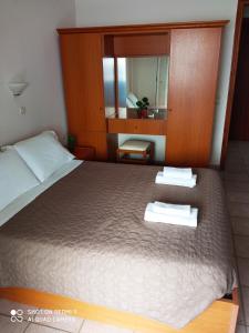Postel nebo postele na pokoji v ubytování Agios Georgios - 2 Beds - Sleeps 5 - Free Parking