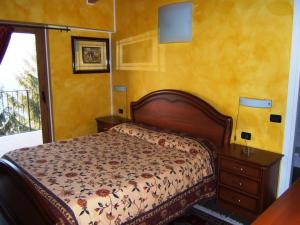 Кровать или кровати в номере Hotel Empire Resort