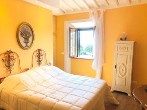 Ένα ή περισσότερα κρεβάτια σε δωμάτιο στο Luxury House Il Borgo Antico