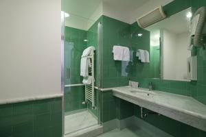 Kúpeľňa v ubytovaní Hotel Portavaldera