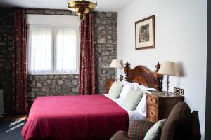 Postel nebo postele na pokoji v ubytování Hotel Los Caspios