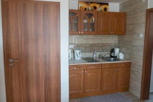 A kitchen or kitchenette at Rita-Vár Szálláshely