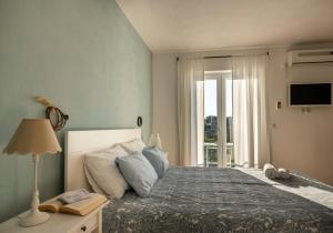 Postel nebo postele na pokoji v ubytování Charming tale apartments Modun19
