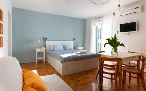Postel nebo postele na pokoji v ubytování Charming tale apartments Modun19