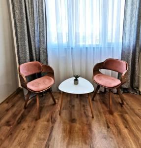 Posezení v ubytování Guest rooms Denicija