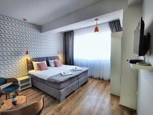 Postel nebo postele na pokoji v ubytování Guest rooms Denicija