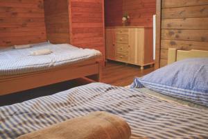 Postel nebo postele na pokoji v ubytování Chata Aktiv
