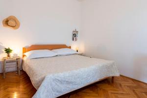 Postel nebo postele na pokoji v ubytování Charming tale apartments Modun19
