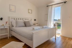 Postel nebo postele na pokoji v ubytování Charming tale apartments Modun19
