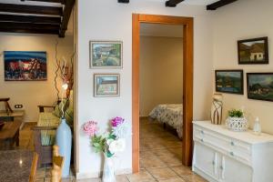 A bed or beds in a room at Casa Rural Les Cabañes