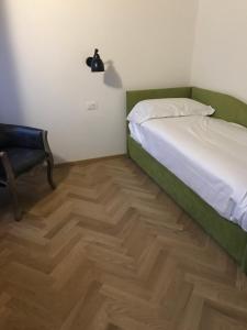 A bed or beds in a room at Hotel Dal Menga