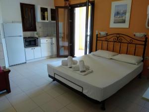 Fotografia z galérie ubytovania MARINOS APARTS (KIMON RESORT) v destinácii Syvota + 37 fotografií