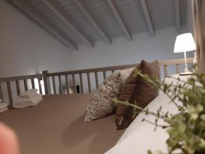 A bed or beds in a room at Apartamentos El Llanin