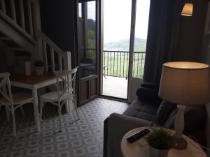 A seating area at Apartamentos El Llanin