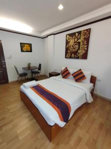 Postel nebo postele na pokoji v ubytování WeRest Hotel