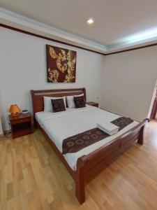 Postel nebo postele na pokoji v ubytování WeRest Hotel
