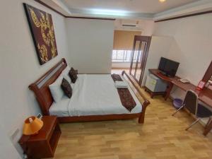 Postel nebo postele na pokoji v ubytování WeRest Hotel