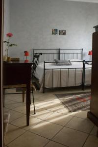 Postel nebo postele na pokoji v ubytování Casa Chiara B&B