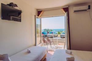 Postel nebo postele na pokoji v ubytování Apartmani Lasta