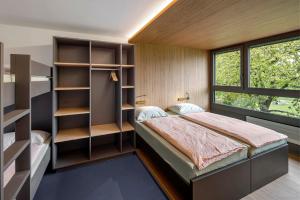 Letto o letti in una camera di Rapperswil-Jona Youth Hostel