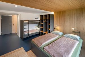 Letto o letti in una camera di Rapperswil-Jona Youth Hostel