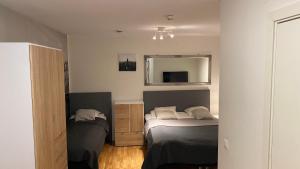 Postel nebo postele na pokoji v ubytování Hotell TunaPark