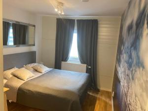Postel nebo postele na pokoji v ubytování Hotell TunaPark + 37 fotografií