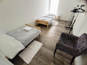 Ένα ή περισσότερα κρεβάτια σε δωμάτιο στο Comfort Apartment for 6 & Loggia & Free Parking