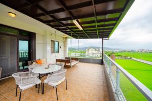 Balkón nebo terasa v ubytování 宜人生活溜滑梯親子民宿 Easylife B&B