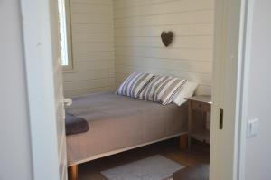 Katil atau katil-katil dalam bilik di Kainiemen Huvilat