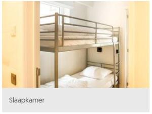 Ένα ή περισσότερα κρεβάτια σε δωμάτιο στο Koksijde Zeedijk LaDigue102 appartement garage excl-lateraal zeezicht